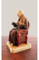 Statua Padre Pio seduto, colorato.